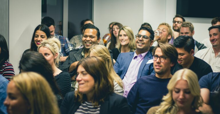 conference audience looking interested in speaker