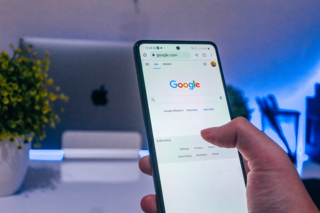 person on iphone using google to search